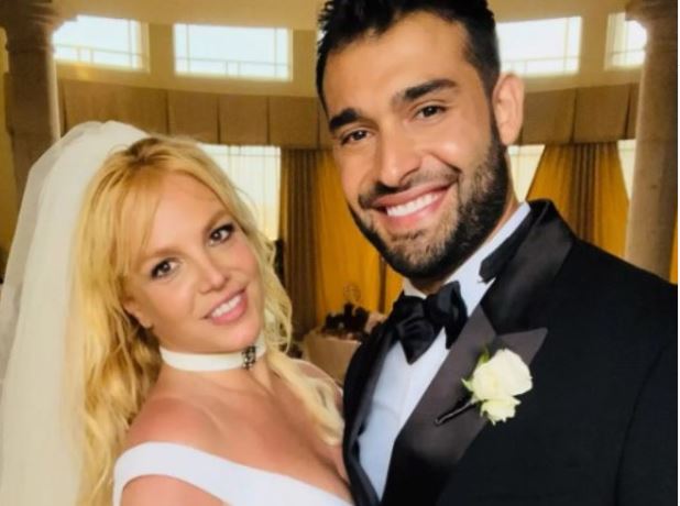 10 Pictures Of Britney Spears And Sam Asghari Versace Wedding Dress, Diamond Ring, And Jewelry Worth Over $570,000