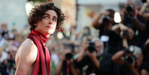 How Much Is Timothée Chalamet's Net Worth? The Actor Says It's “Tough To Be Alive” Nowadays