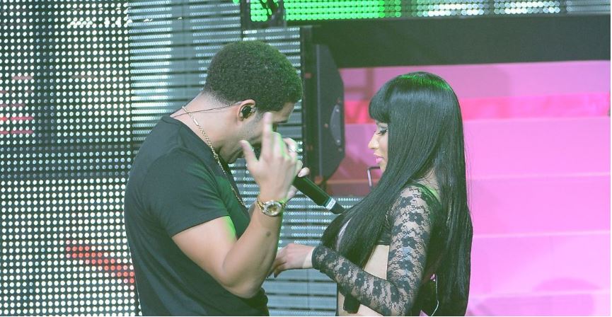 Nicki Minaj and Drake performing together at a concert. 