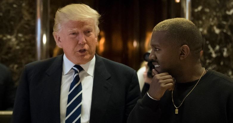 NEW YORK, NY - DECEMBER 13: (L to R) President-elect Donald Trump and Kanye West walk into the lobby at Trump Tower, December 13, 2016 in New York City. President-elect Donald Trump and his transition team are in the process of filling cabinet and other high level positions for the new administration. (Photo by Drew Angerer/Getty Images)