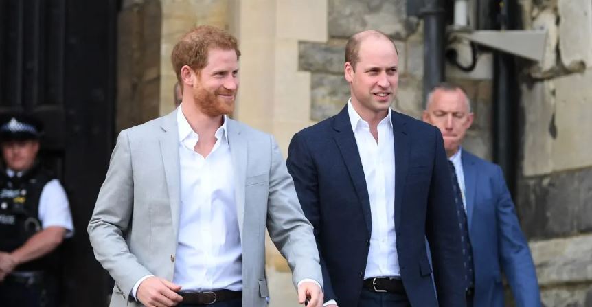(l-r): Harry and Prince William walking together. SOURCE: GETTY IMAGES
