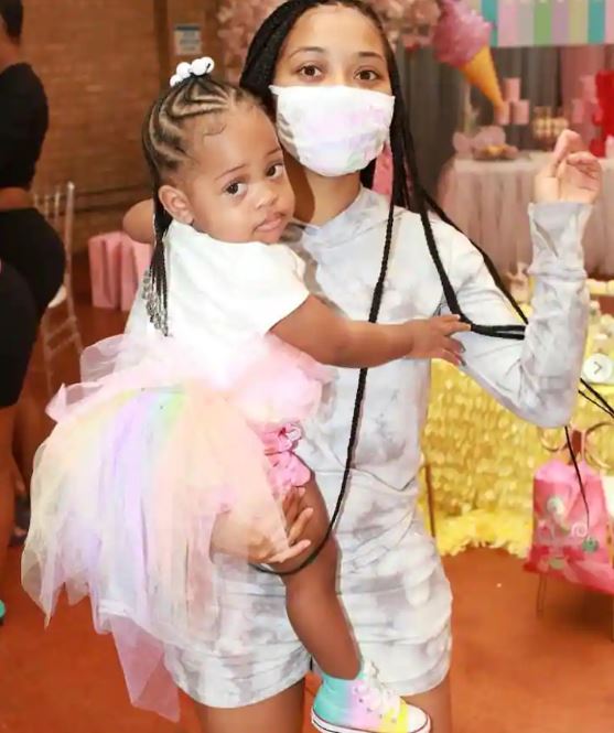 India Royale, Lil Durk’s wife, holding their daughter Willow Banks.
